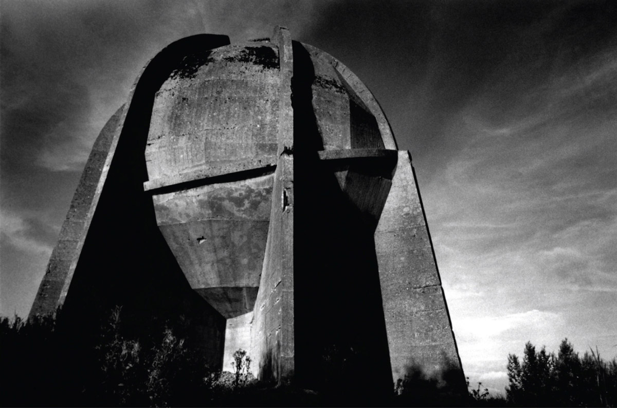 1996 photograph by Julian Hills of a sound mirror construction at Dungeness.