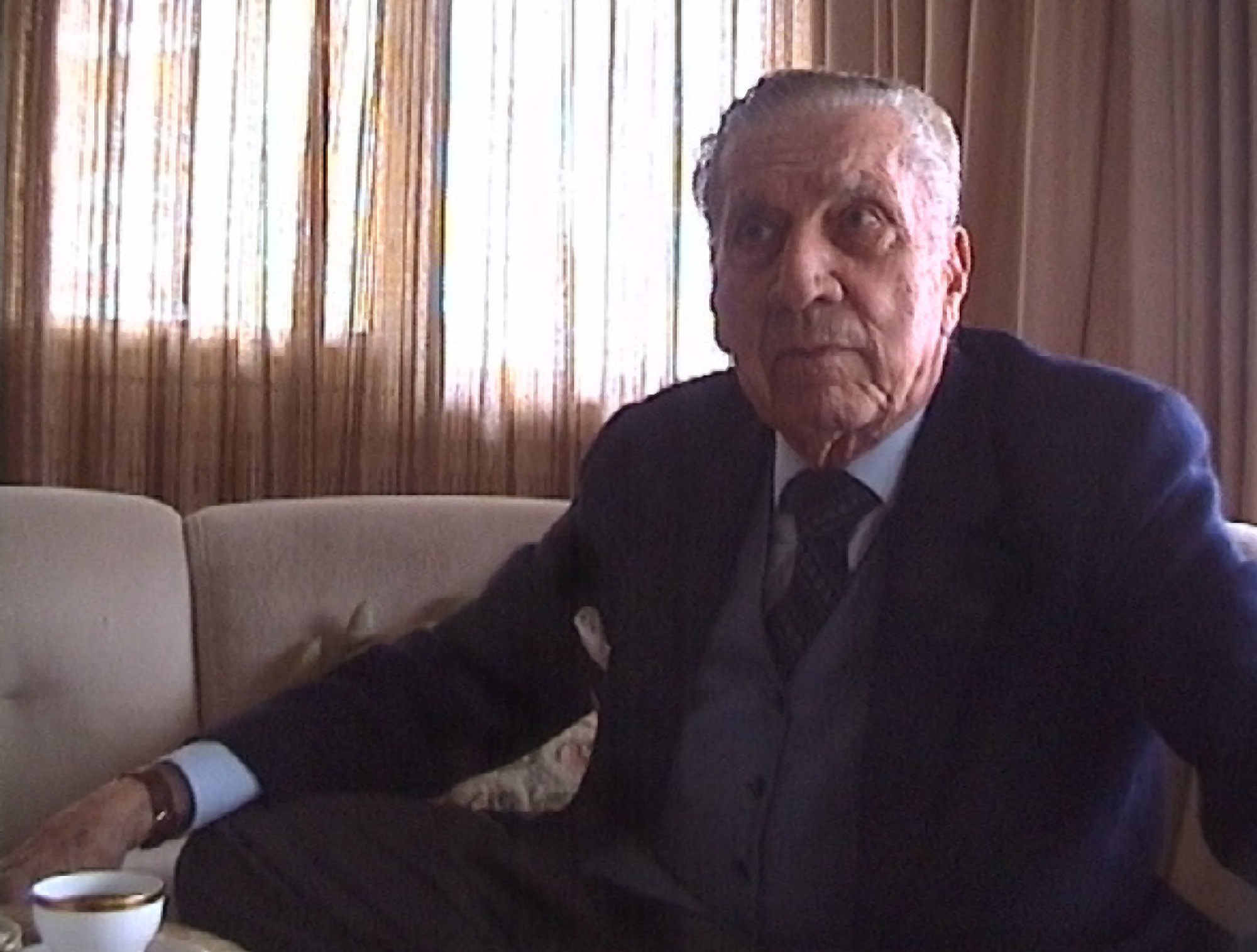 A video still of Delgado in his apartment in Madrid.