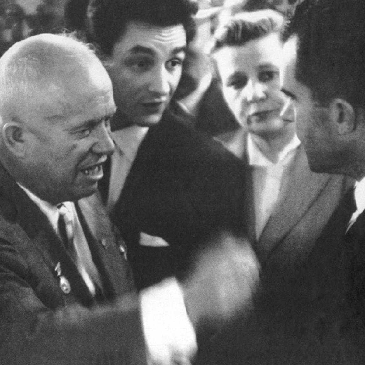 A photograph of Khrushchev and Nixon at the Kitchen Debate.