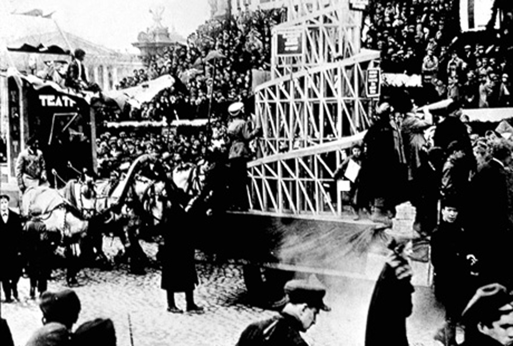 A photograph of the model of Tatlin’s tower, being used in demonstration, 1 May nineteen twenty five.