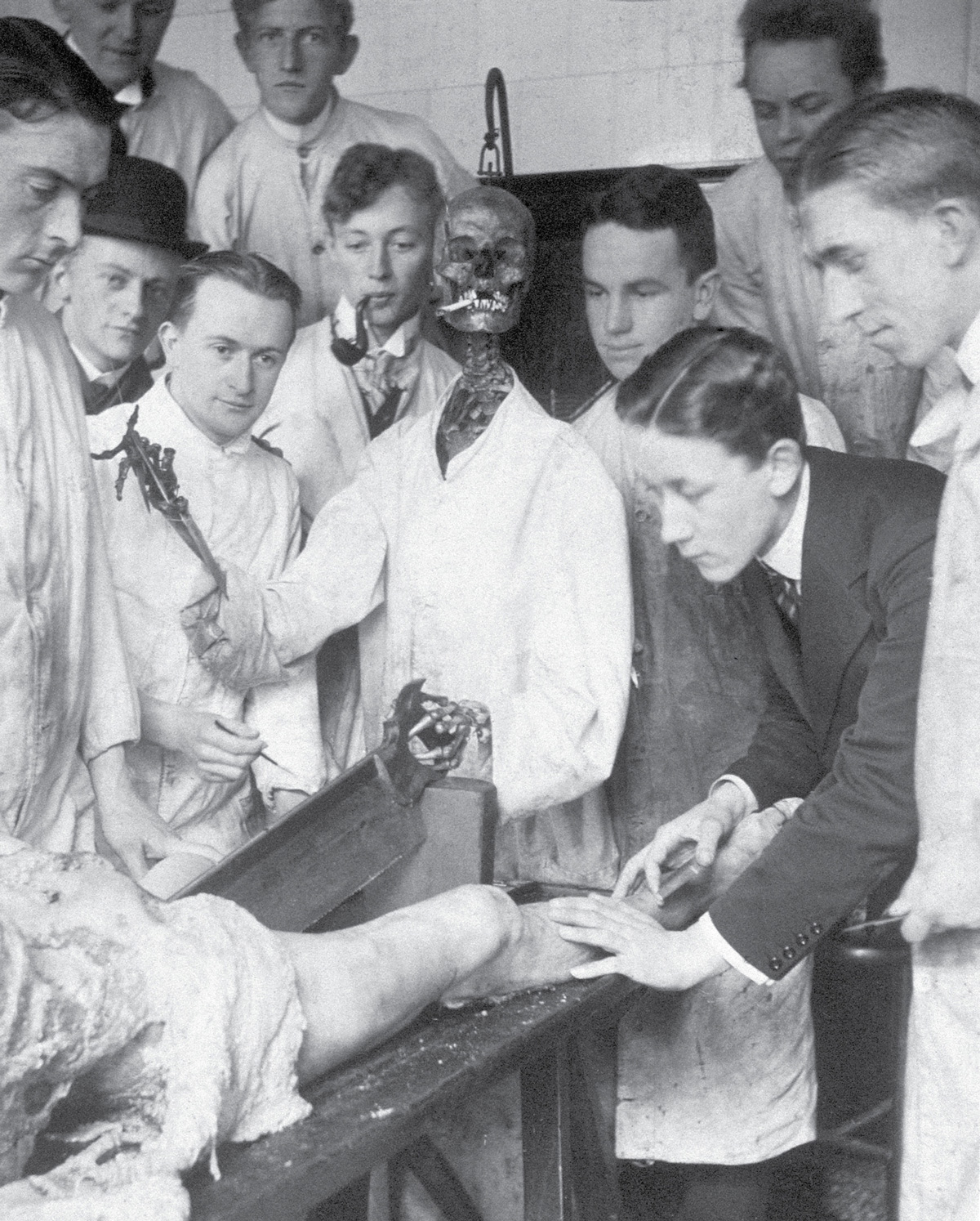 A photograph of a skeleton dressed and posed as a surgeon in the dissection hall at the Academy of Surgery, Copenhagen, circa nineteen ten.
