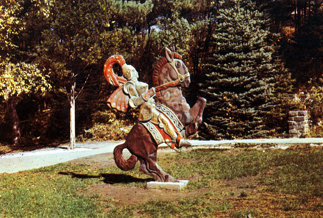 A postcard from Joseph Urban’s Gingerbread Castle in Hamburg, New Jersey featuring an image of a sculpture of a knight on a horse and captioned “Prince Charming as he appears in the garden of the Gingerbread Castle.” 