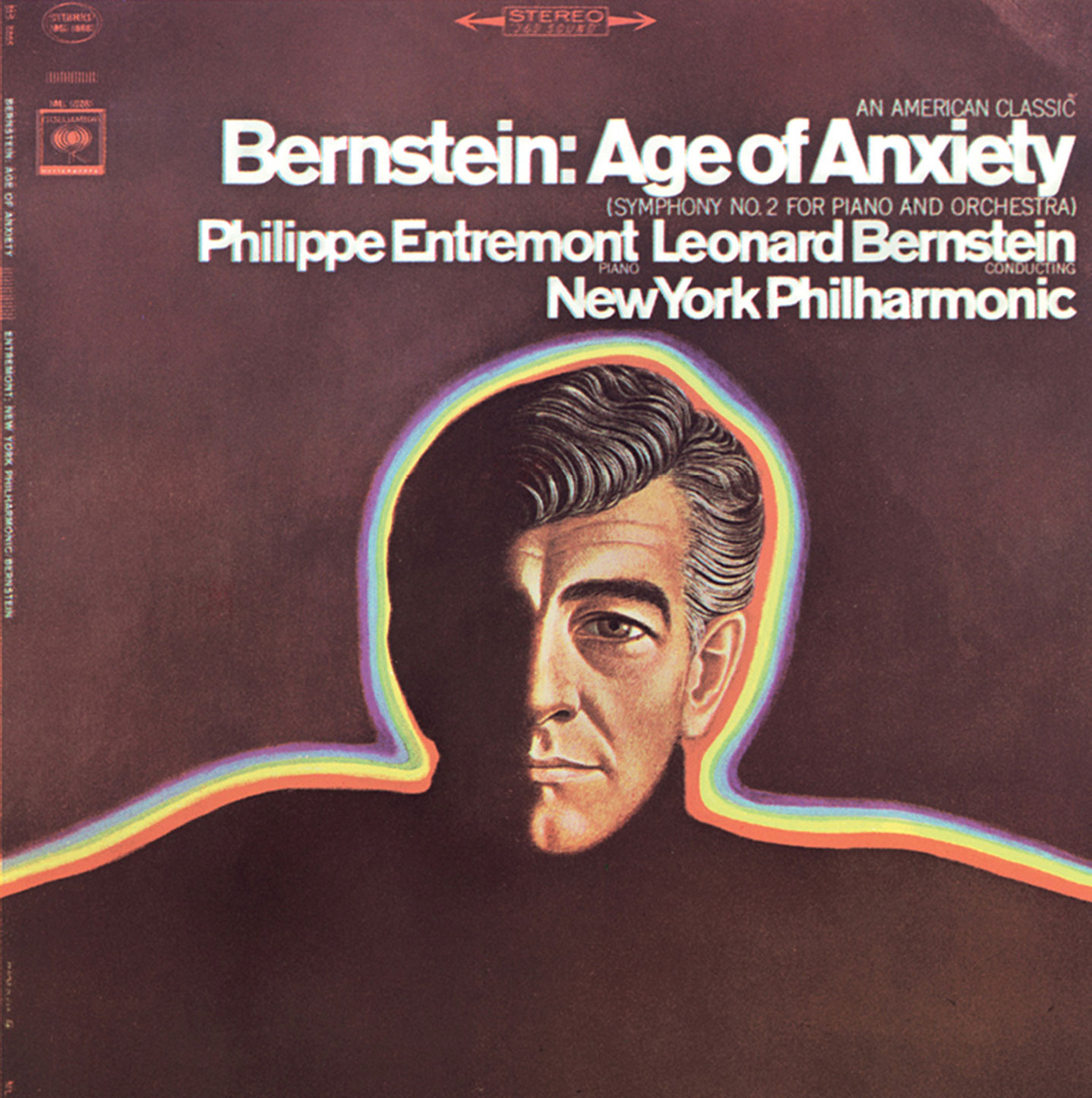 An LP cover of Leonard Bernstein’s “Age of Anxiety” from circa nineteen sixty-three, depicting Bernstein surrounded by fluorescent lines of color.