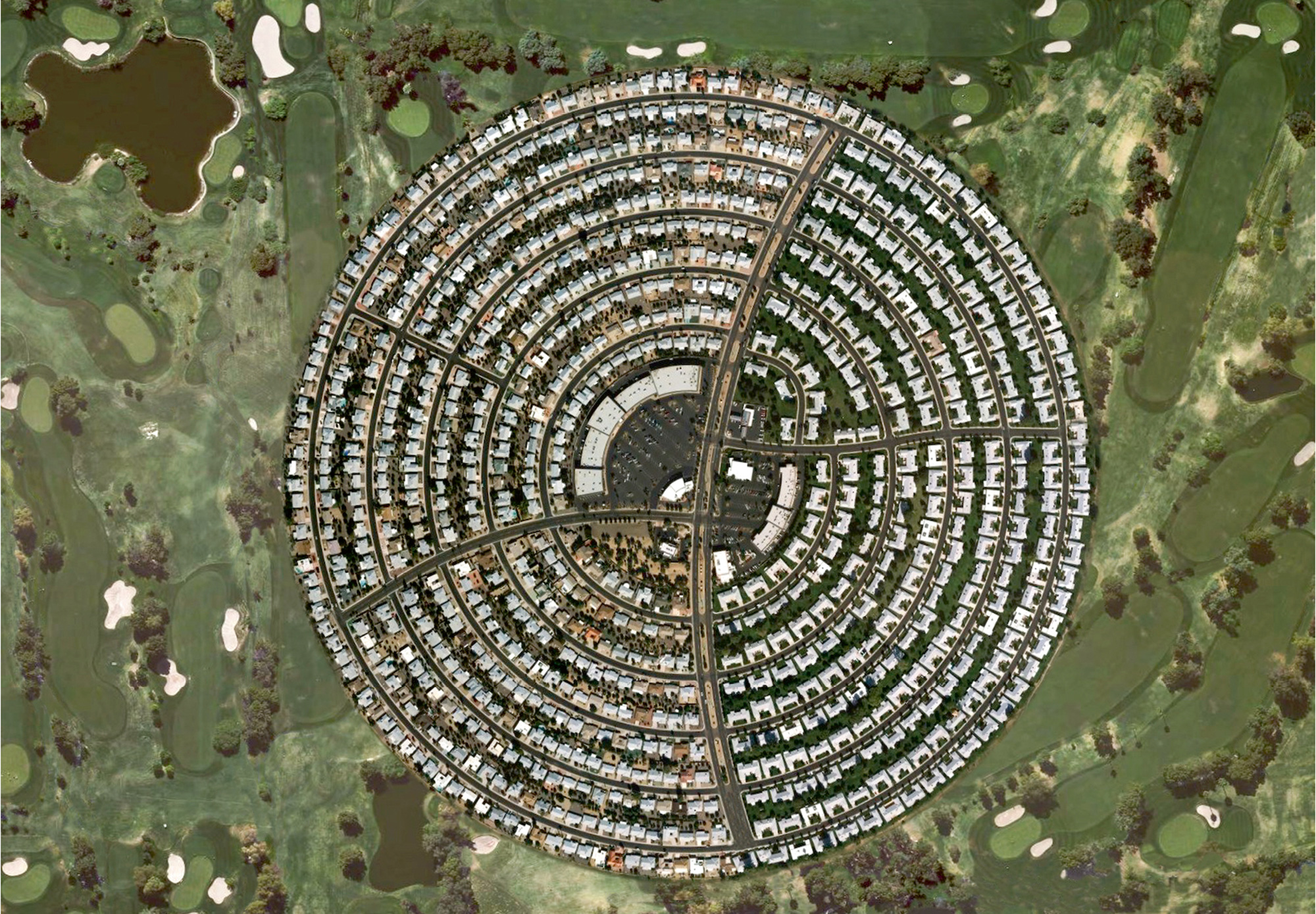 An altered aerial photograph by Jeremy Drummond of a planned housing community in Arizona.