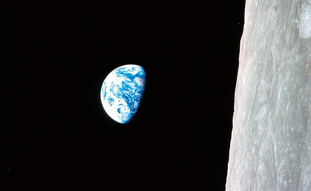 A photograph of the “earthrise,” as photographed by Apollo 8 on 12 December nineteen sixty-eight. 