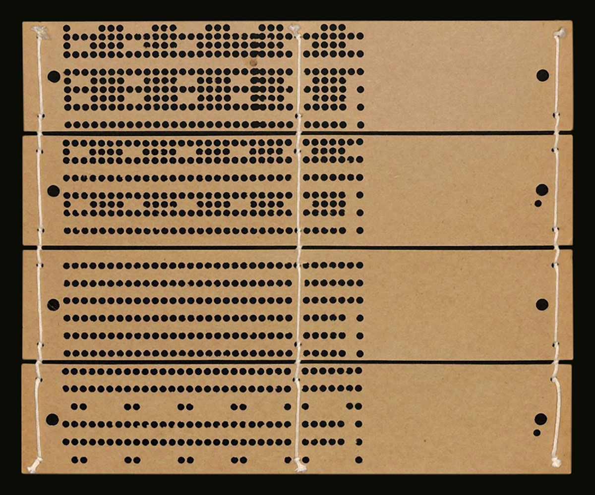 A circa eighteen oh one Jacquard punch card. Joseph Marie Jacquard’s system of punch cards for automated looms was based on the work of Vaucanson, who in the seventeen forties had used the technology, often found in music boxes and automata, to make mechanized looms.