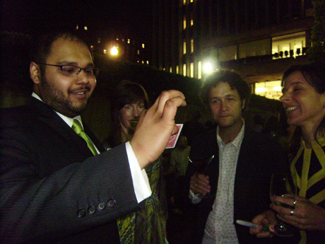 Prakash Purdu, close-up magician from the Artifice Group blowing guests’ minds. Note Philippa Kaye’s googly eyes.