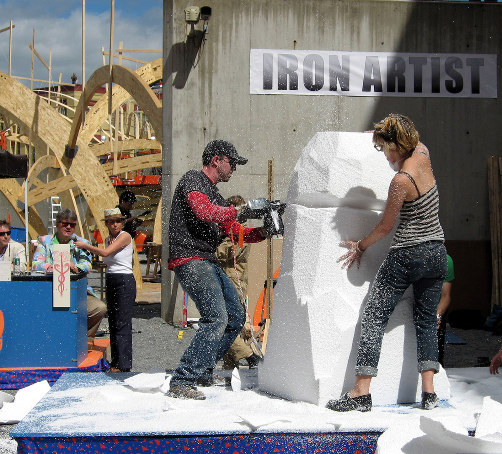 Both teams begin sculpting with large foam blocks.