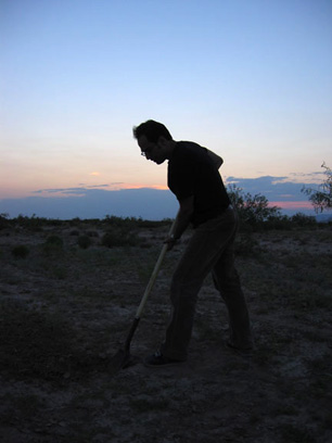 Sina Najafi digging a hole for Luke Murphy