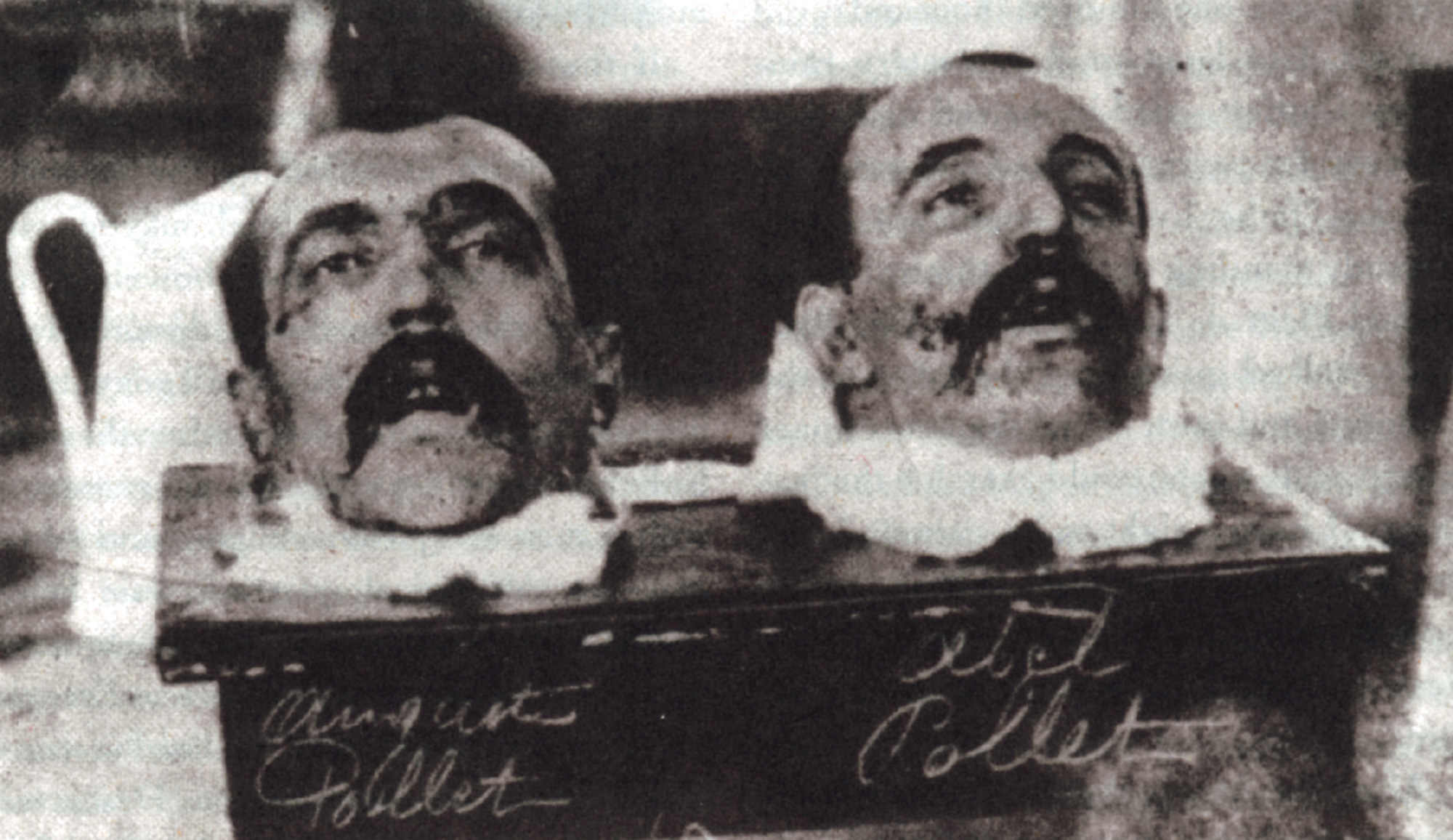 The severed heads of convicted armed robbers and twin brothers Auguste and Abel Pollet, guillotined on 11 January 1909.