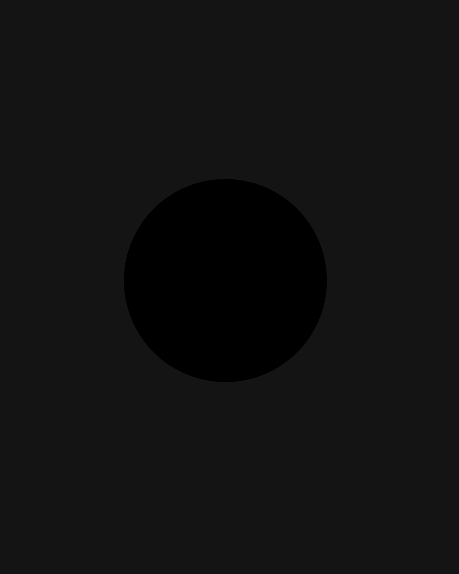 A field of black surrounding an even blacker circle.