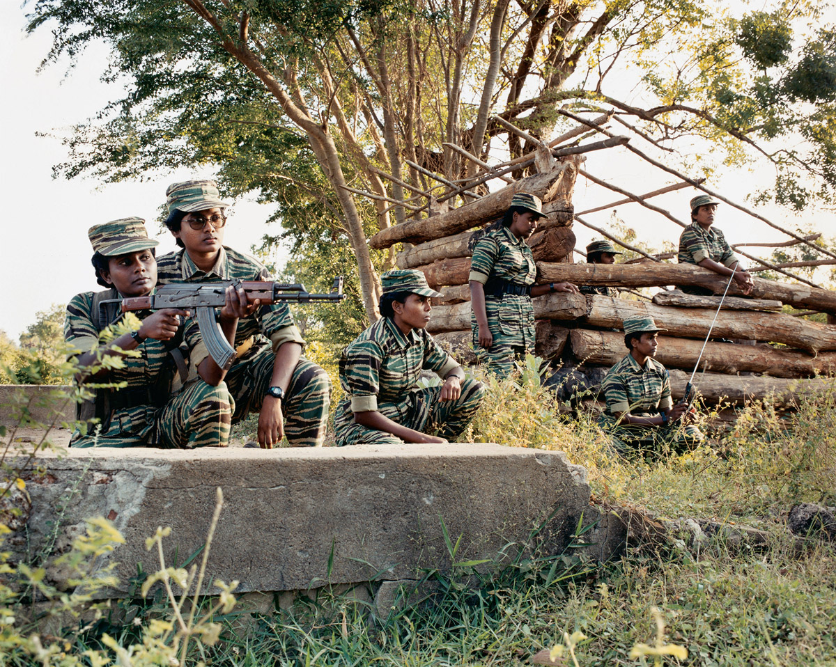 A photograph of Bird of Freedom members keeping watch and holding their guns.