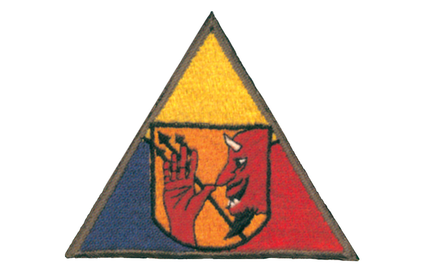 Authorized insignia of the Army Experimental Station, depicting a devil in the center of a multi-colored triangle.