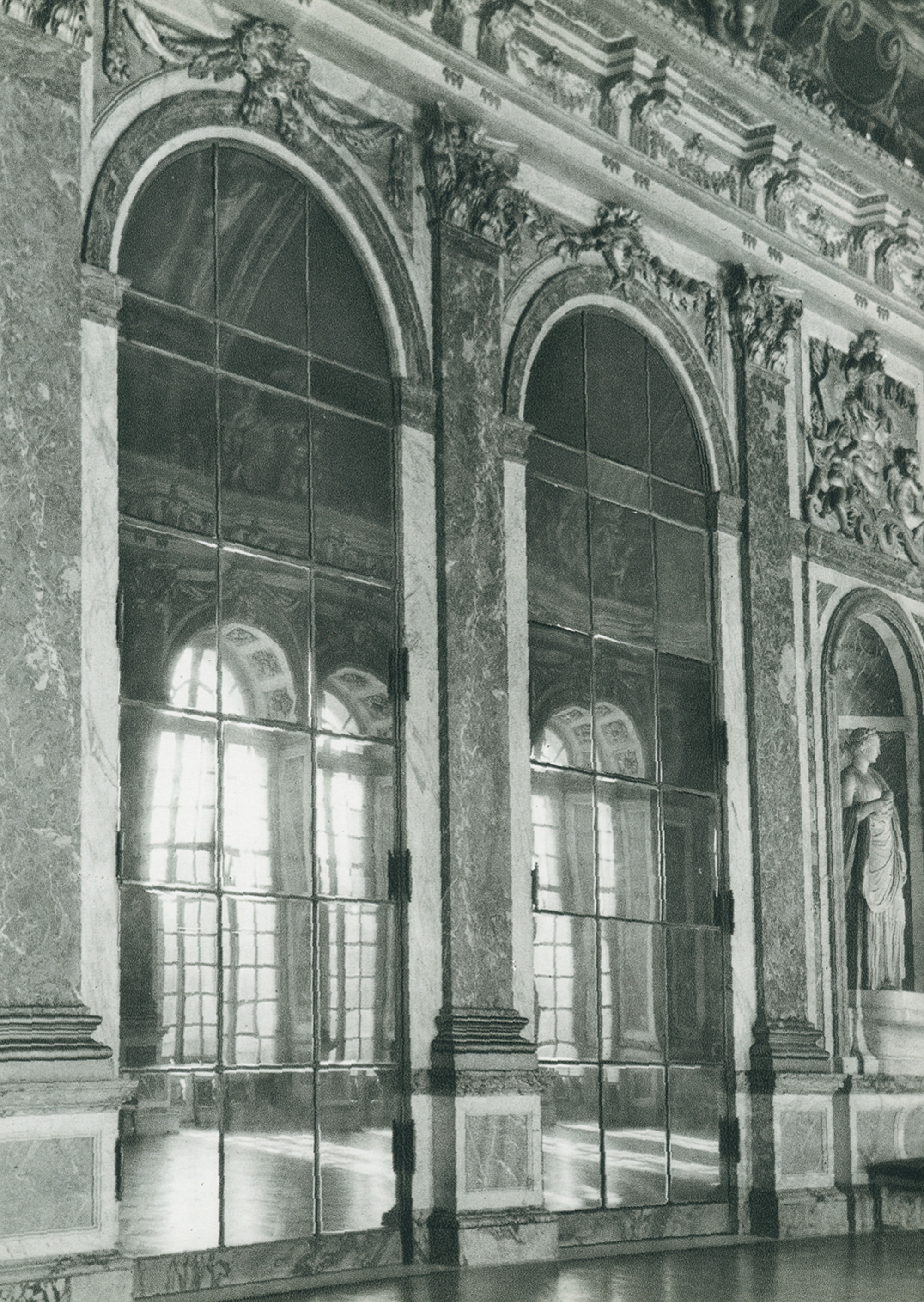 A photograph of Louis XIV’s Hall of Mirrors in the Palace of Versailles.