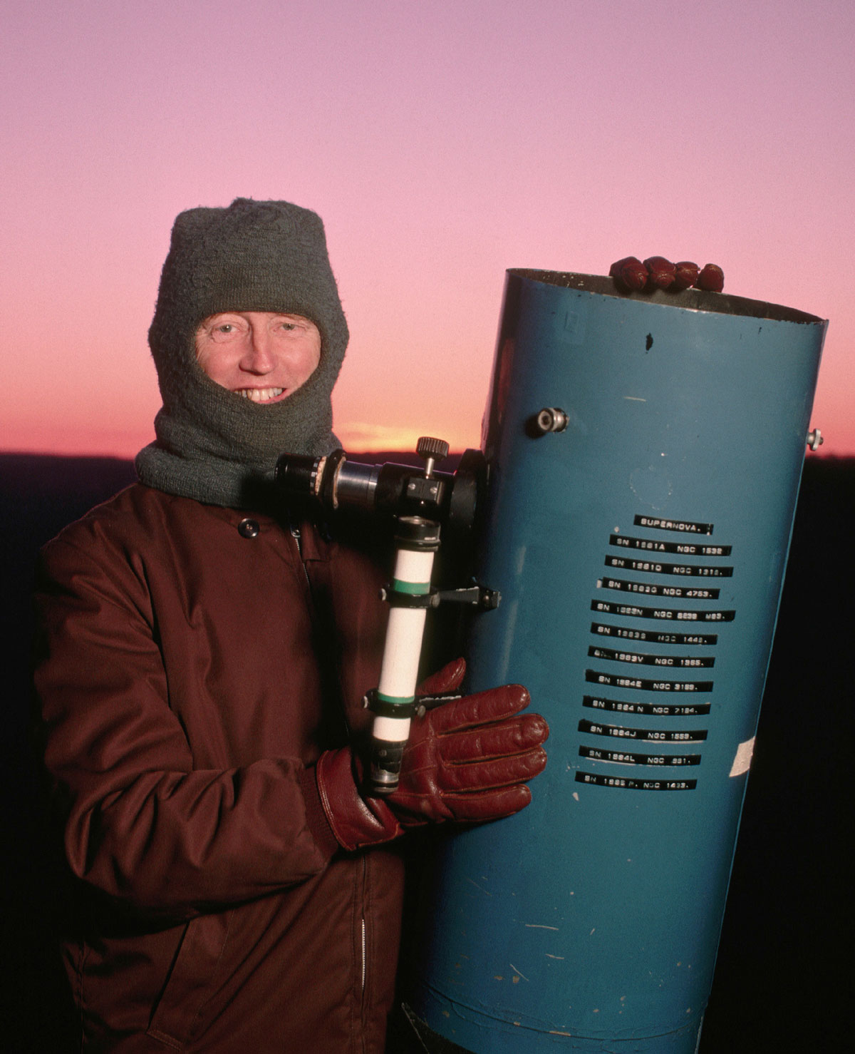Circa 1988 photograph of Robert Evans with his telescope.