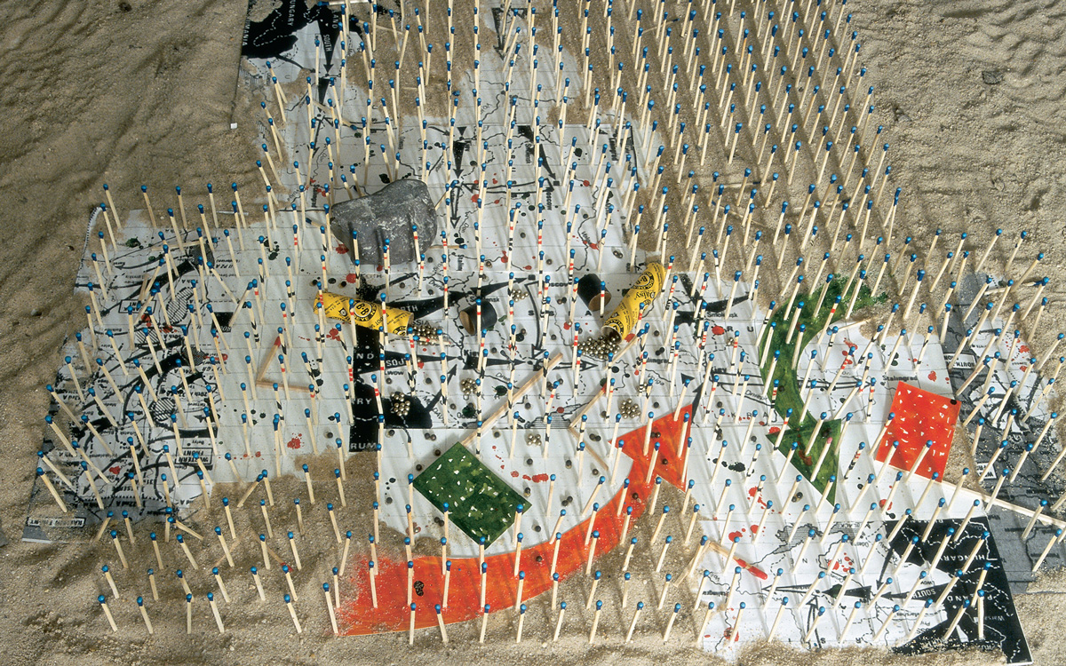 A photograph of a re-creation of David’s match game by the author, using simulated Ohio Blue Tips marked with insignia to represent the Tauridan Army. The game was often played on the beach, as it is in this photograph.