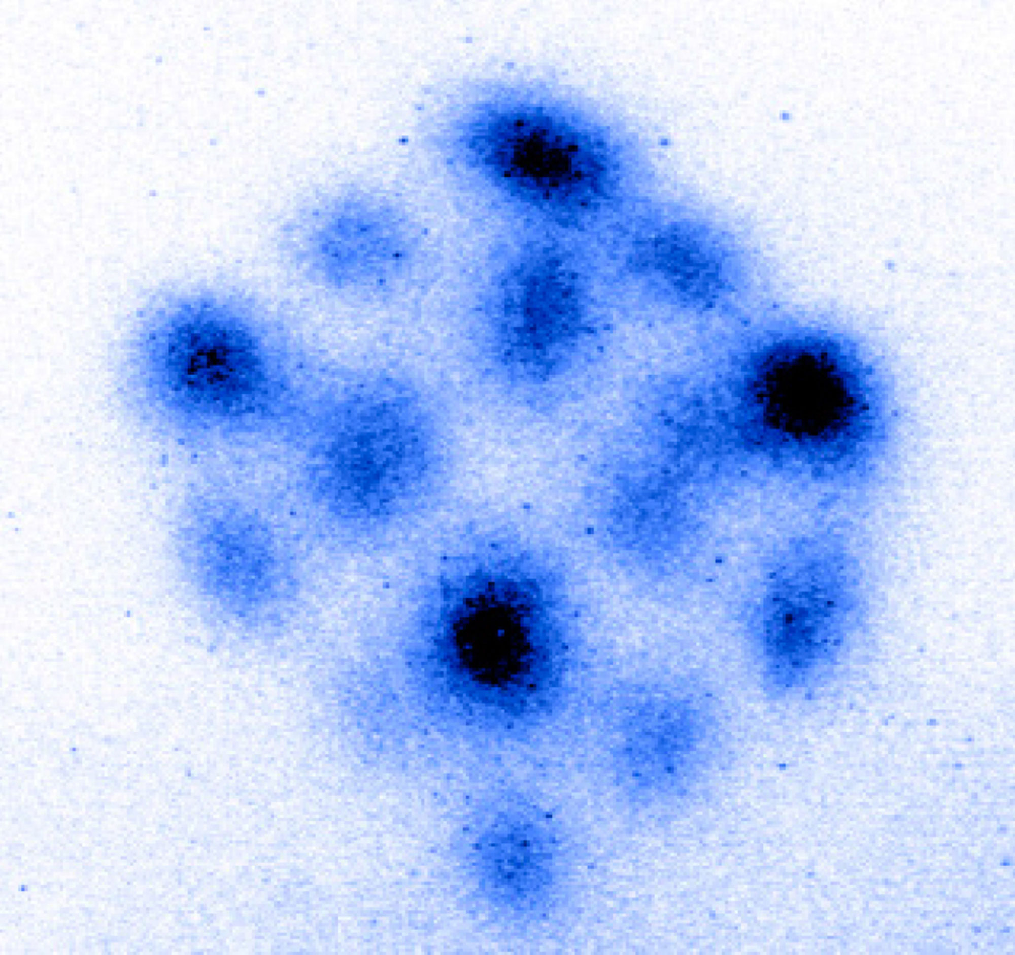 An image showing the emergence of cubic structure in ultra-low temperature strontium atoms under red laser irradiation. 