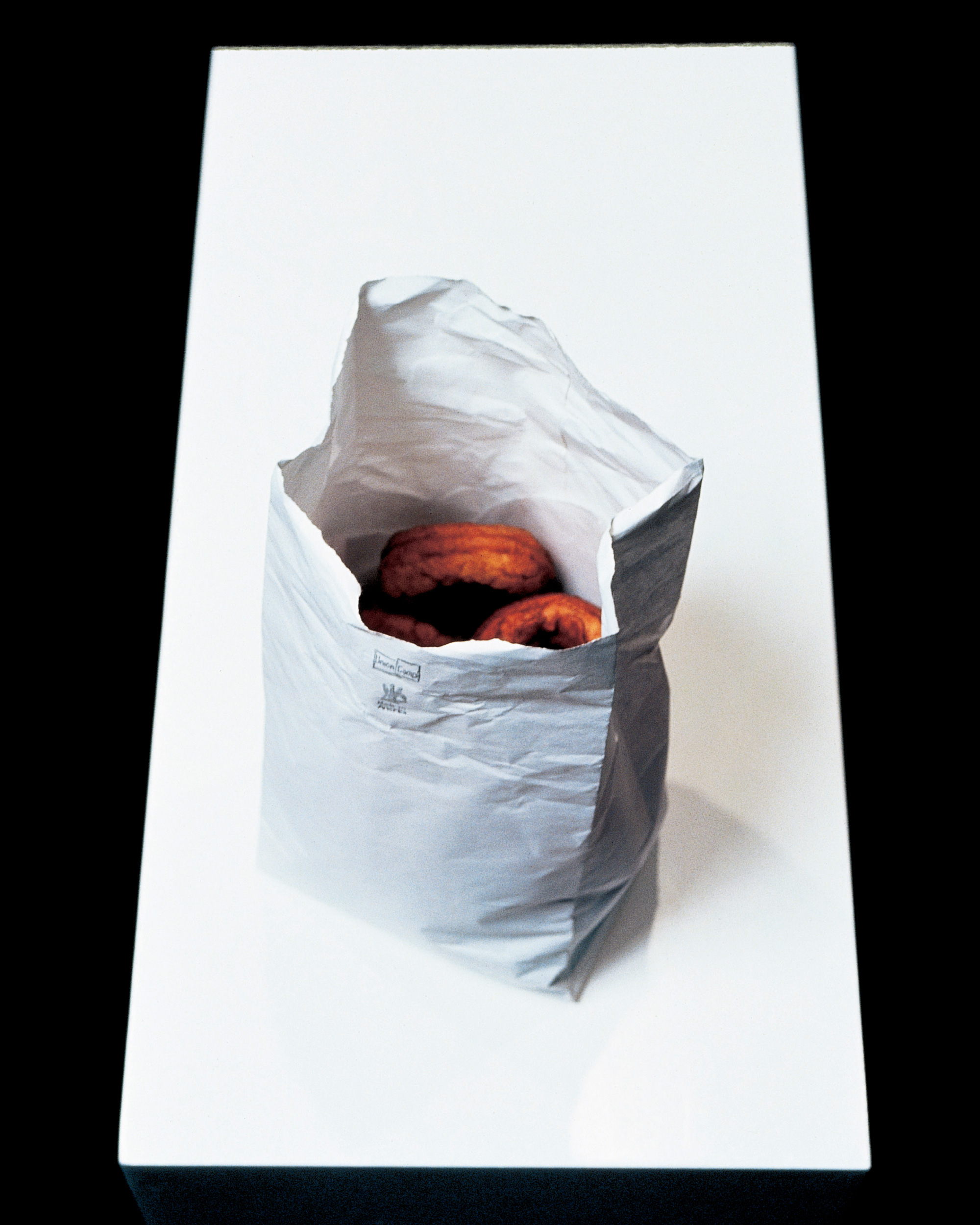 A 1989 sculpture by Robert Gober entitled “Bag of Donuts.”