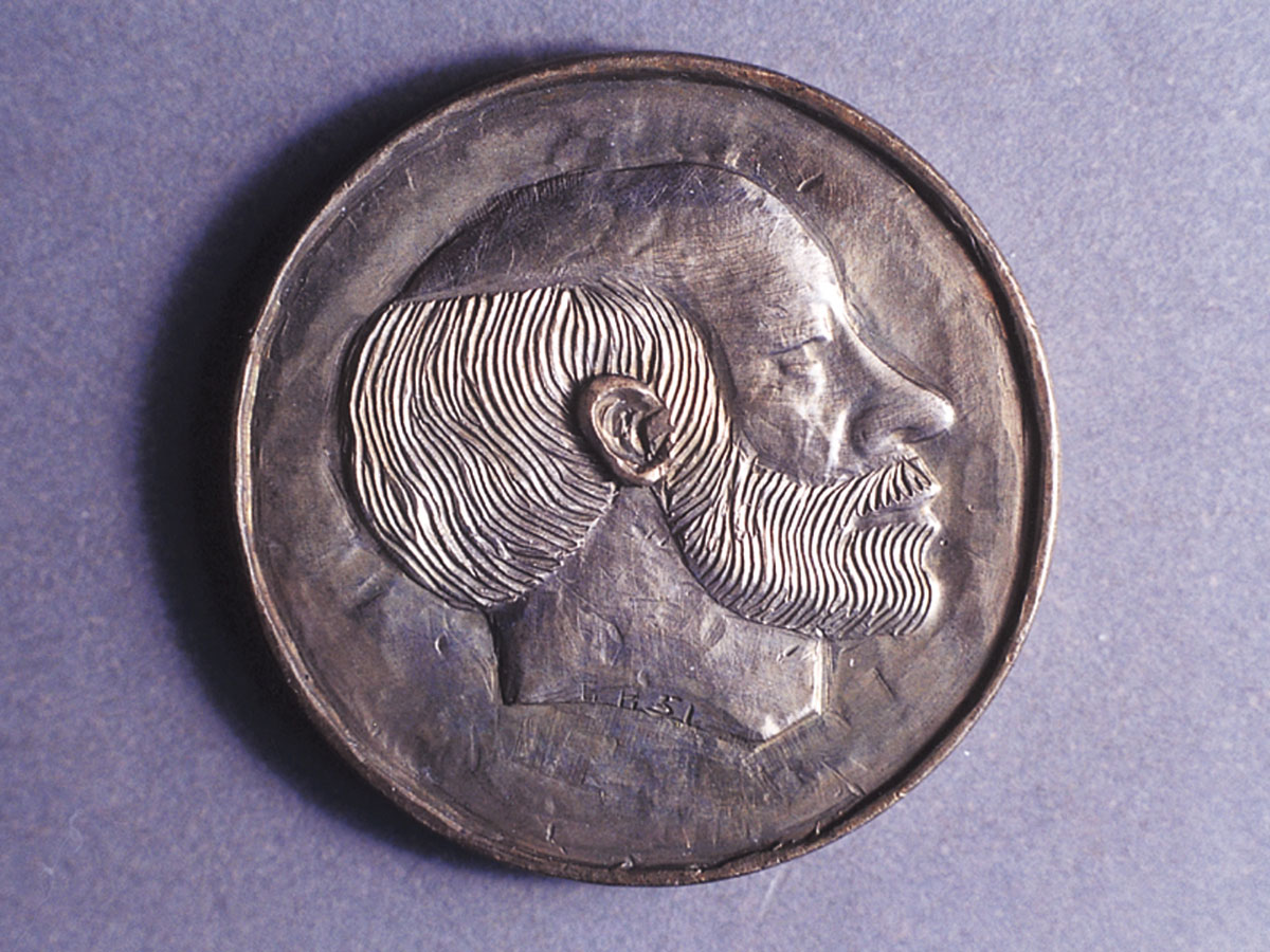 Self-portrait carved by George Washington “Bo” Hughes, one of the premier known hobo nickel artists.
