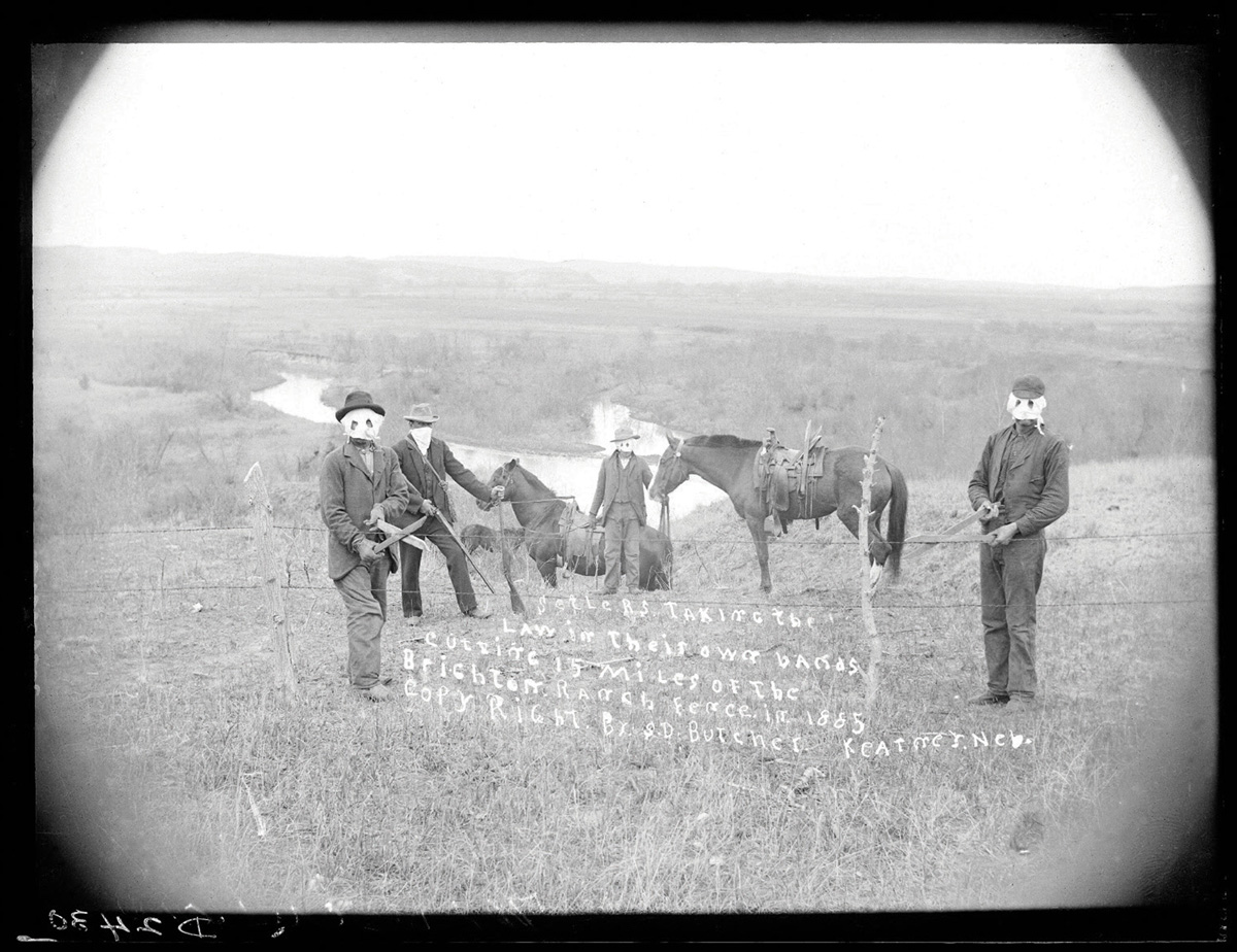 A staged photograph depicting Nebraskan fence-cutters “taking the law into their own hands.” There were frequent clashes between the proponents of open range and the advocates of barbed wire.