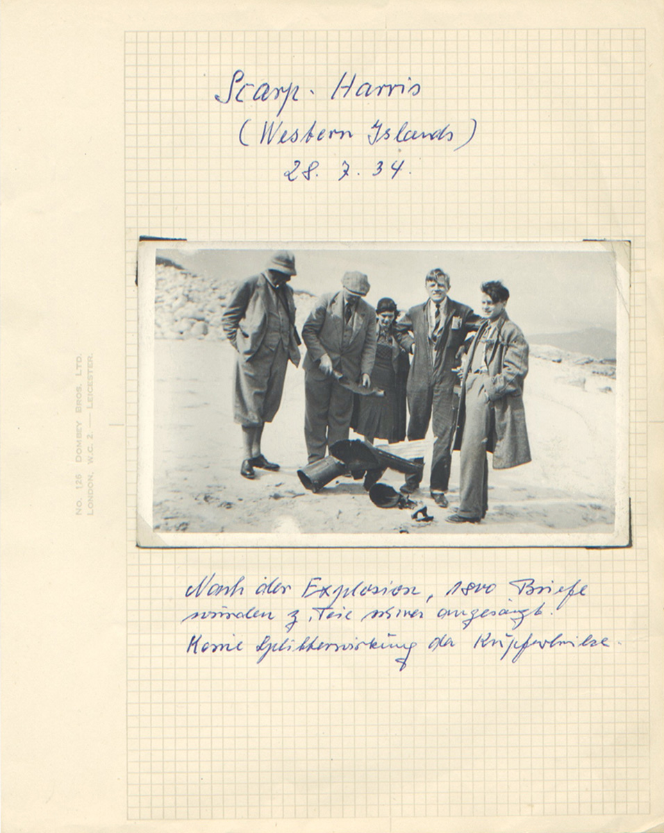 A page from the scrapbook showing a disappointed Zucker grimacing at the camera over the remains of the rocket used in his unsuccessful Scarp-Harris launch in 1934.
