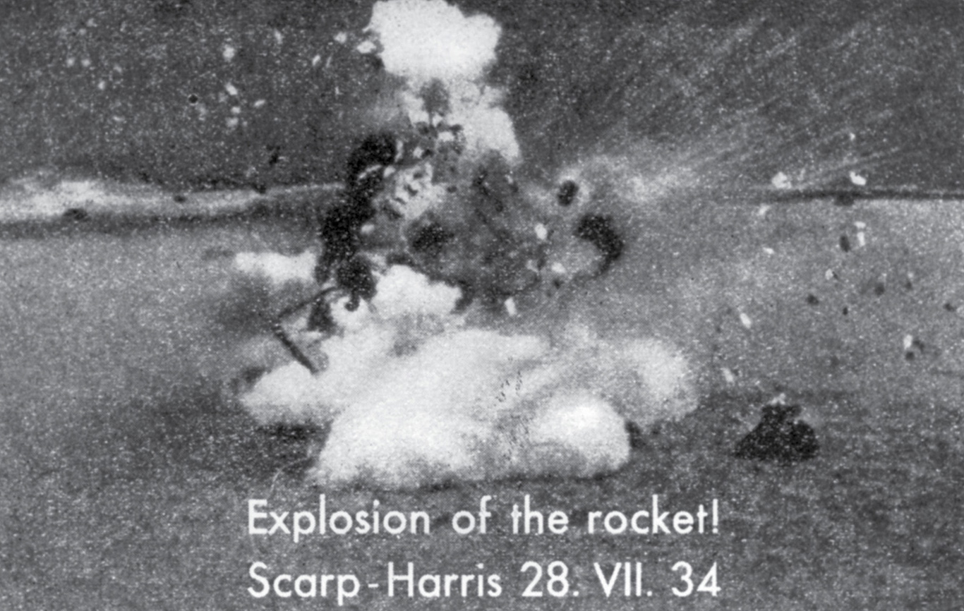 A photograph of the rocket launch at Scarp, nineteen thirty four. The rocket exploded on take-off, scattering letters from its shell.