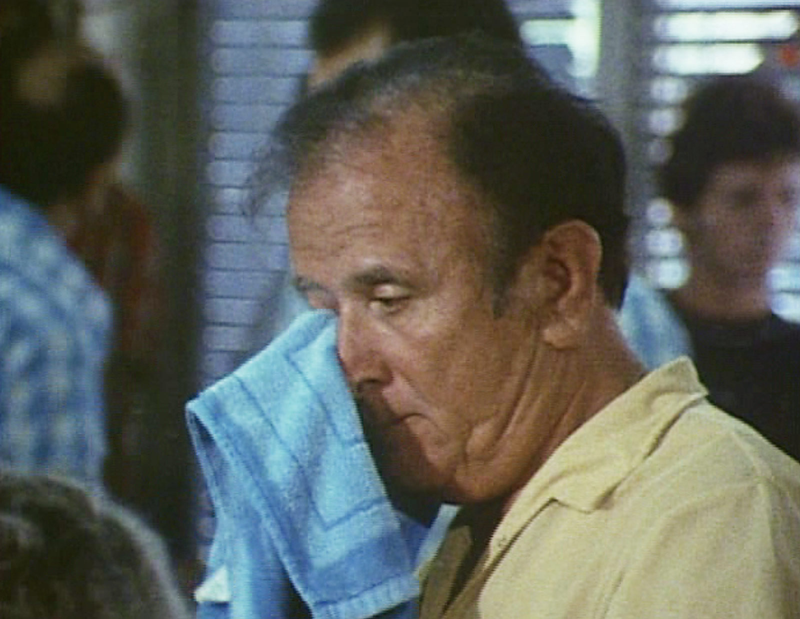 Still from the nineteen eighty five film “Shoah,” by Claude Lanzmann, depicting a scene in a barber shop from various angles.