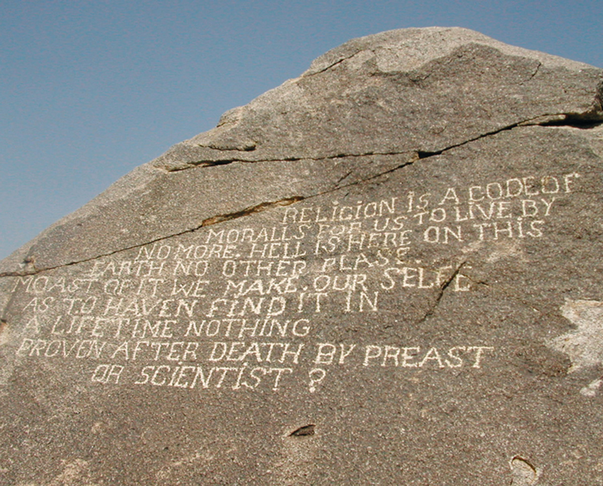 A rock incised with text by John Samuelson.