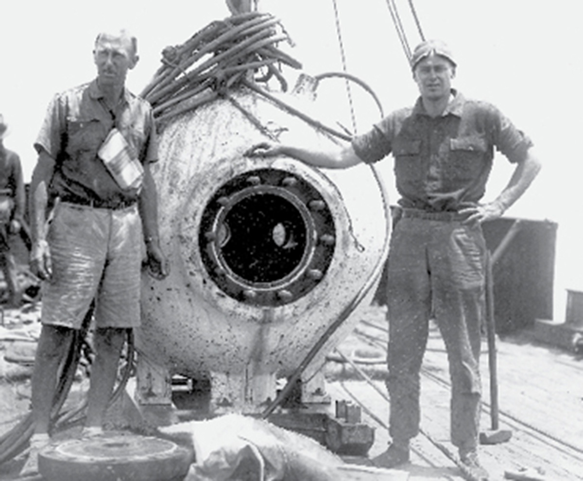 A photograph of William Beebe and Otis Barton with the Bathysphere.