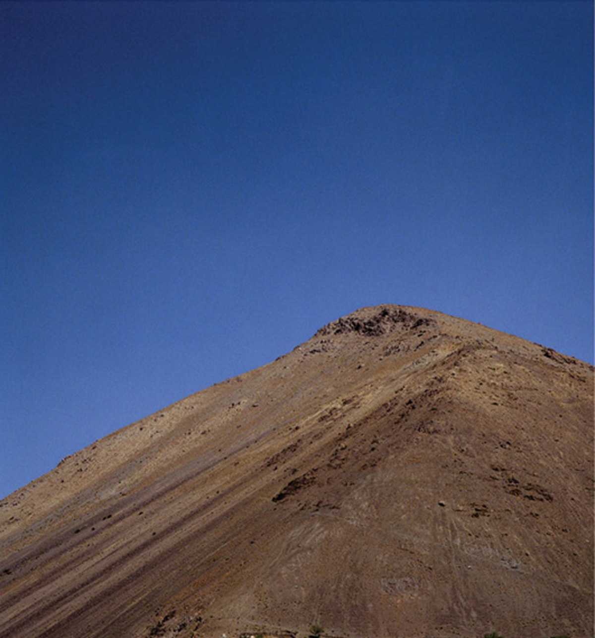 A photograph by artist Marine Hugonnier titled “Mountain with No Name (Pandjshêr Valley, Afghanistan)”, two thousand three.