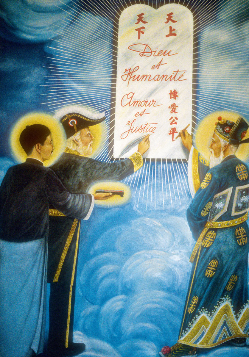 A painting at the entry of the Cao Dai Holy See, depicting three of the religion’s saints: Chinese political leader Sun Yat-sen, French author Victor Hugo, and Vietnamese poet Nguyen Binh Khiem. 