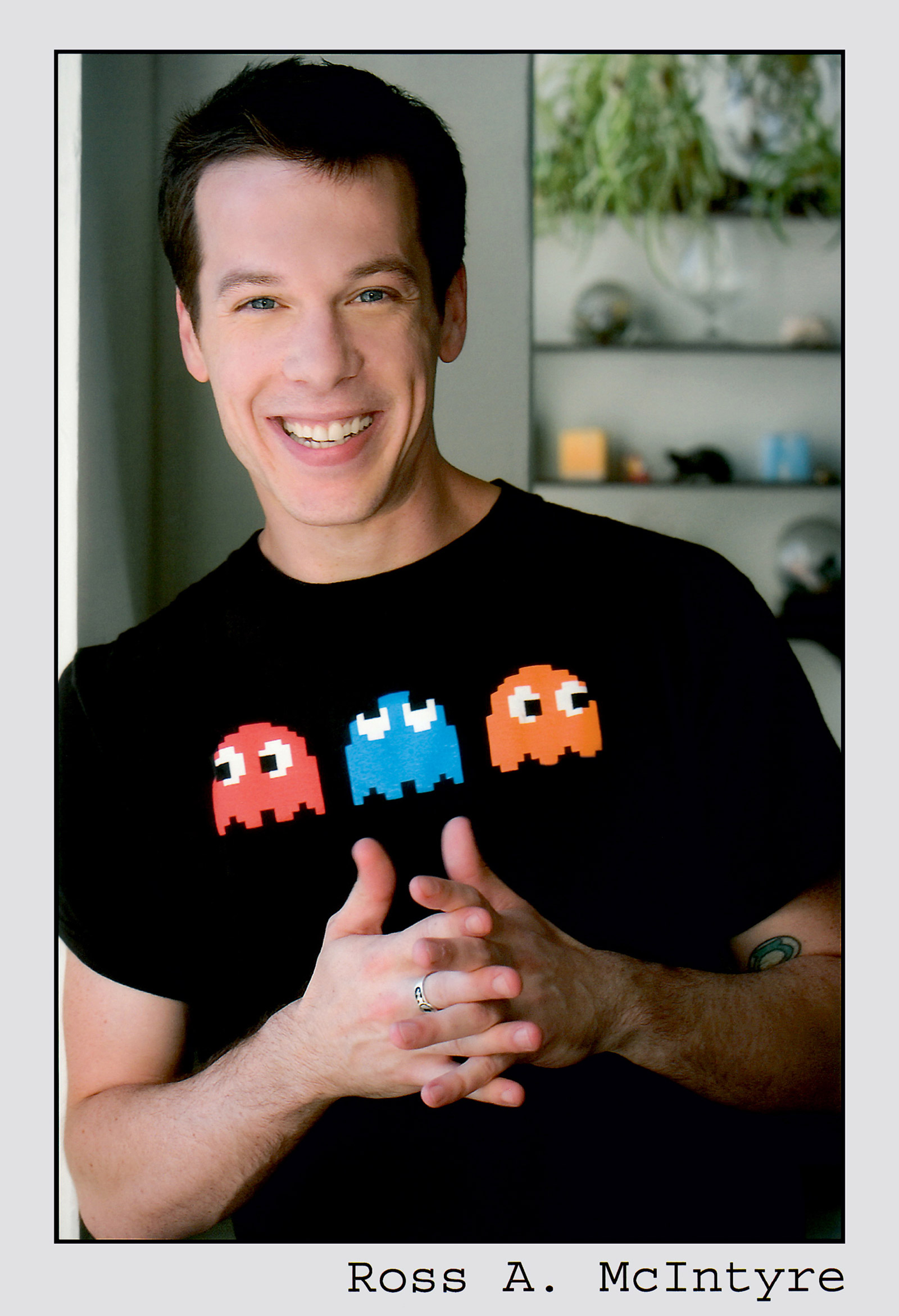 A headshot of Ross.
