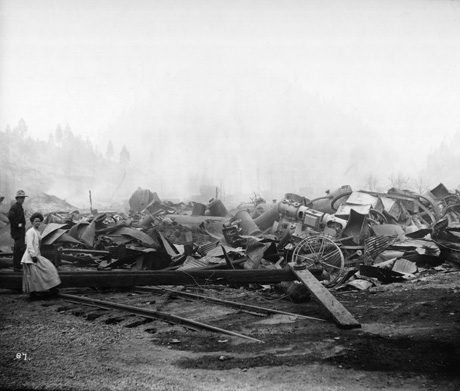A photograph of the ruins of Coeur d'Alene Hardware Warehouse in Wallace, Idaho, after the Big Blowup of 1910.