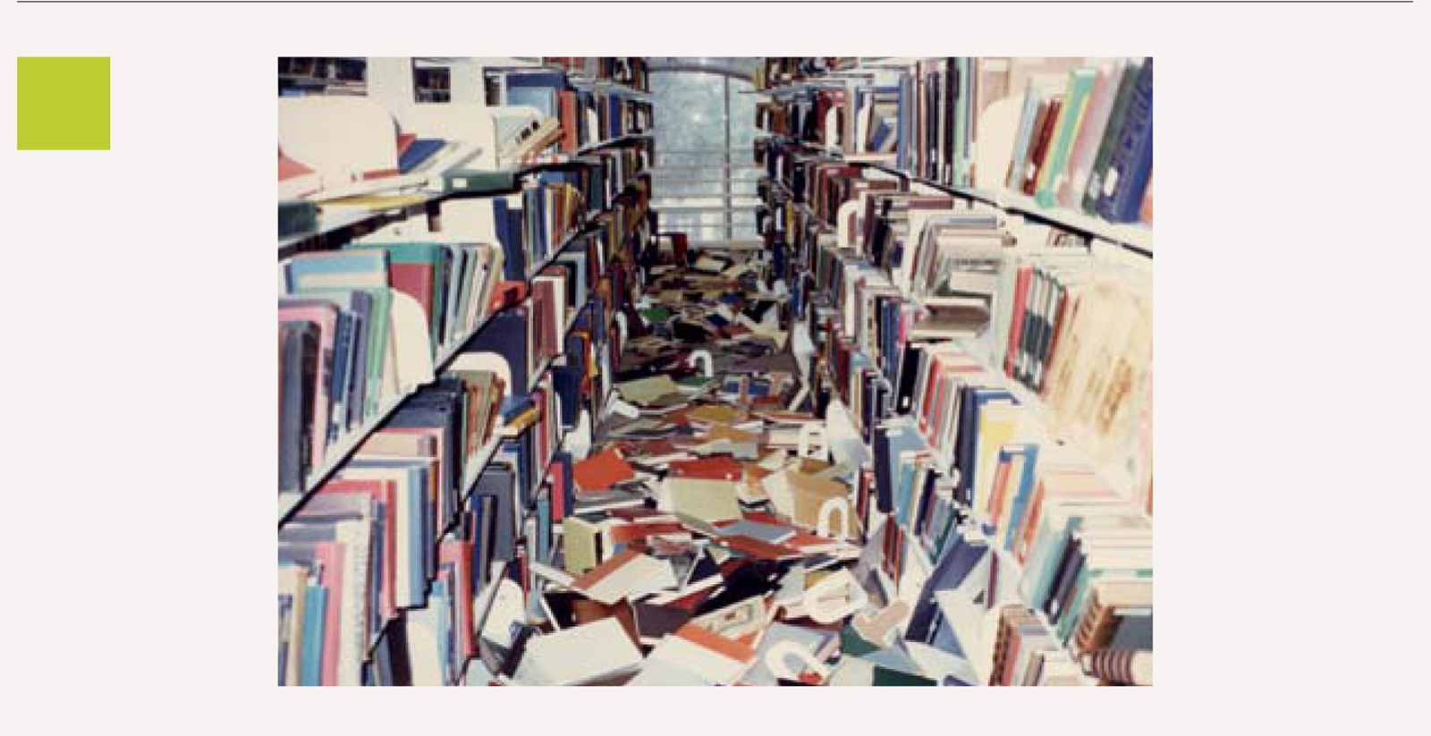 A photograph of toppled books at the Claremont Colleges Library, California, in the aftermath of an earthquake on 28 February 1990. 