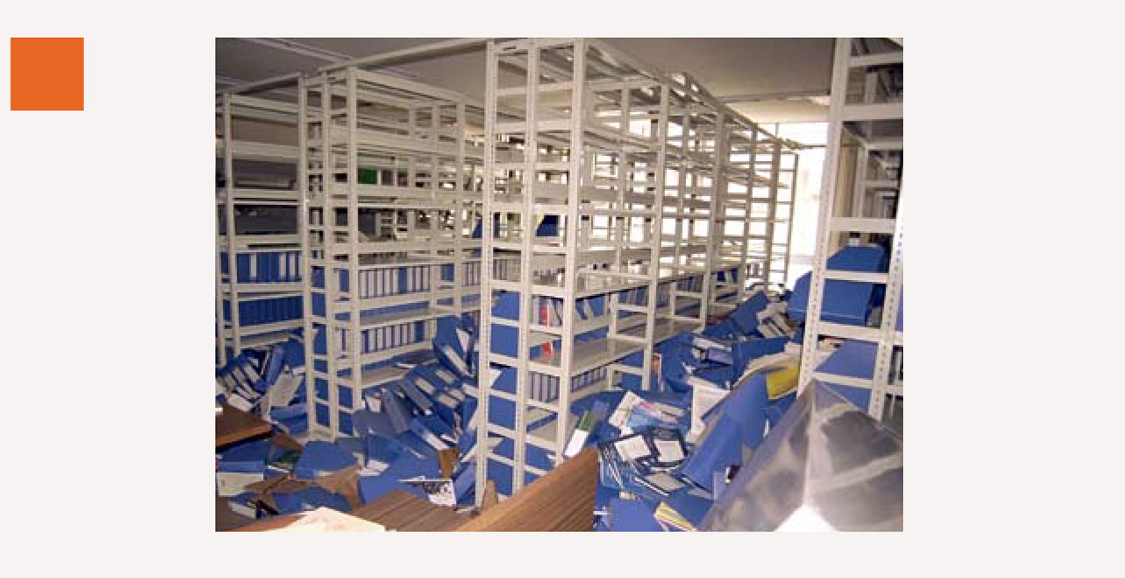 A photograph of toppled books at Japan’s Kobe University Library in the aftermath of an earthquake on 17 January 1995.