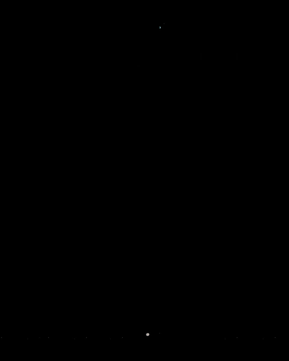 A May 2003 photograph taken by the Mars Global Surveyor when Earth and Jupiter were aligned with Mars. 