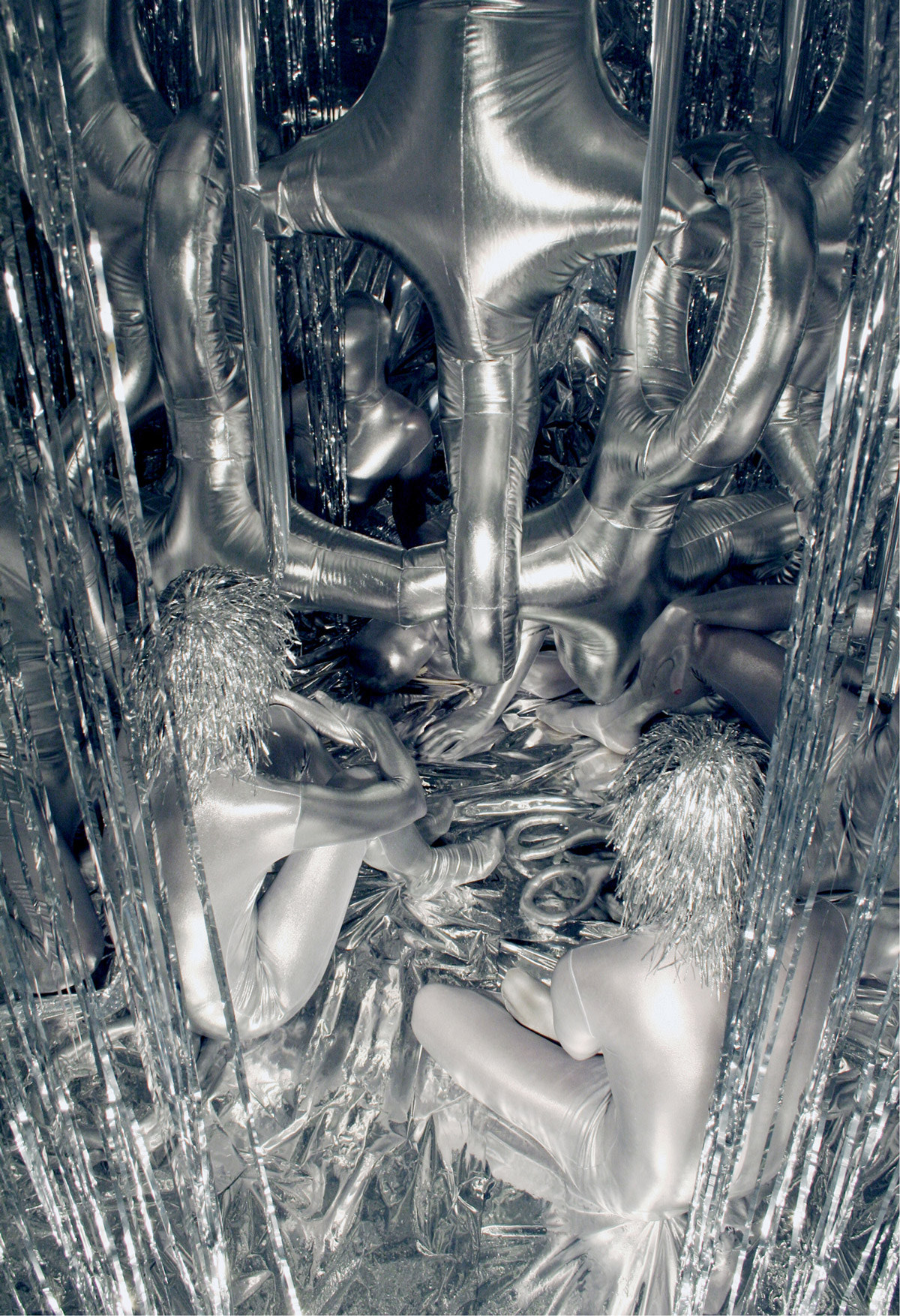 A photograph of an all silver art installation. 