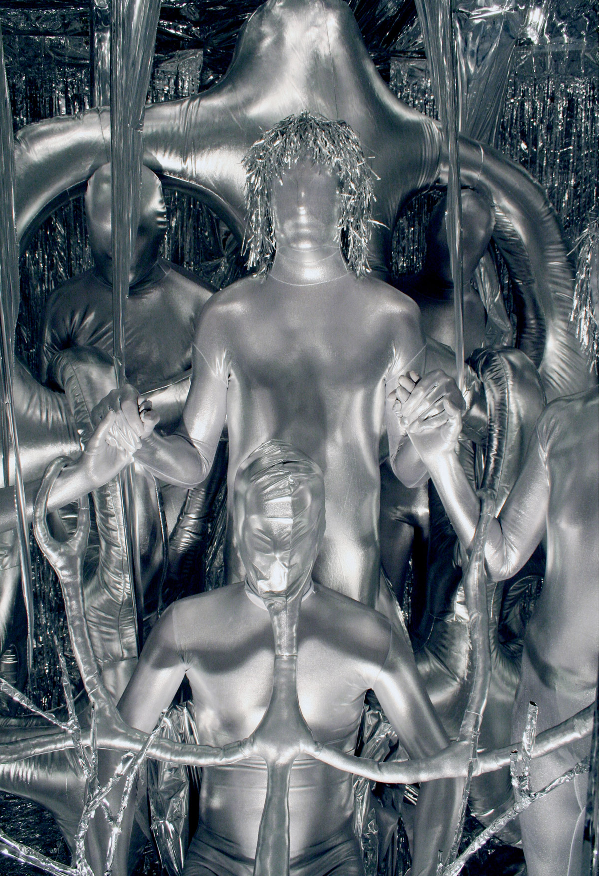 A photograph of an all silver art installation. 