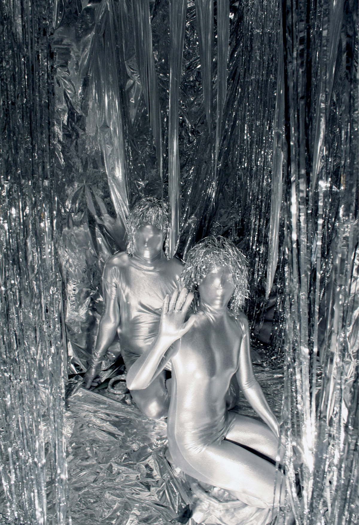 A photograph of an all silver art installation. 