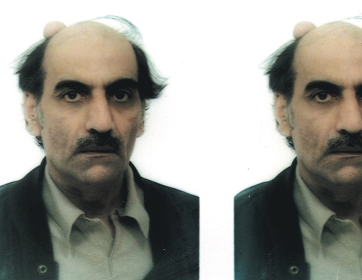Nasseri in photo booth at Charles de Gaulle airport, 2001.