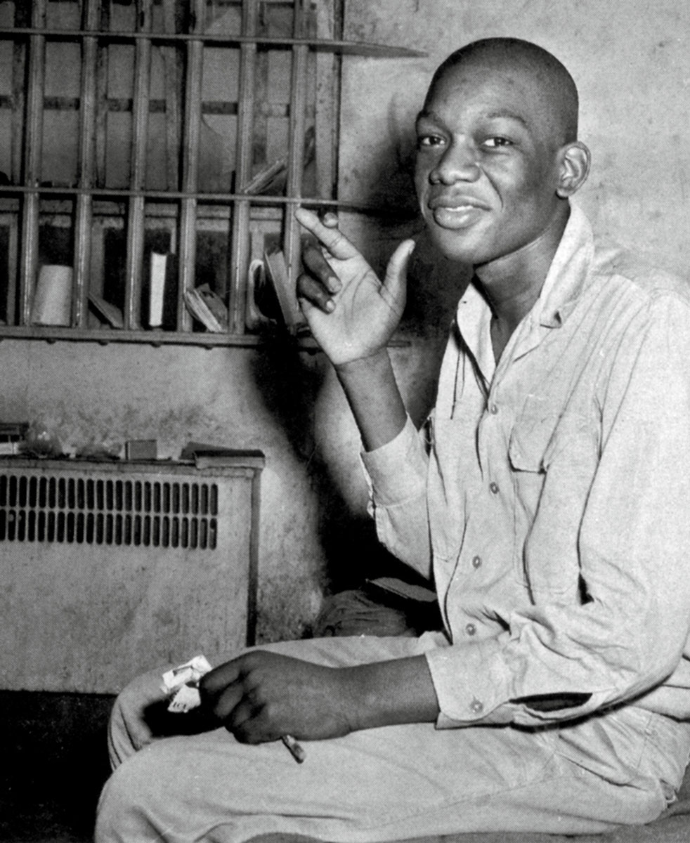 A photograph of Francis, clean-shaven, back in his cell after the failed electrocution of 3 May nineteen forty six.