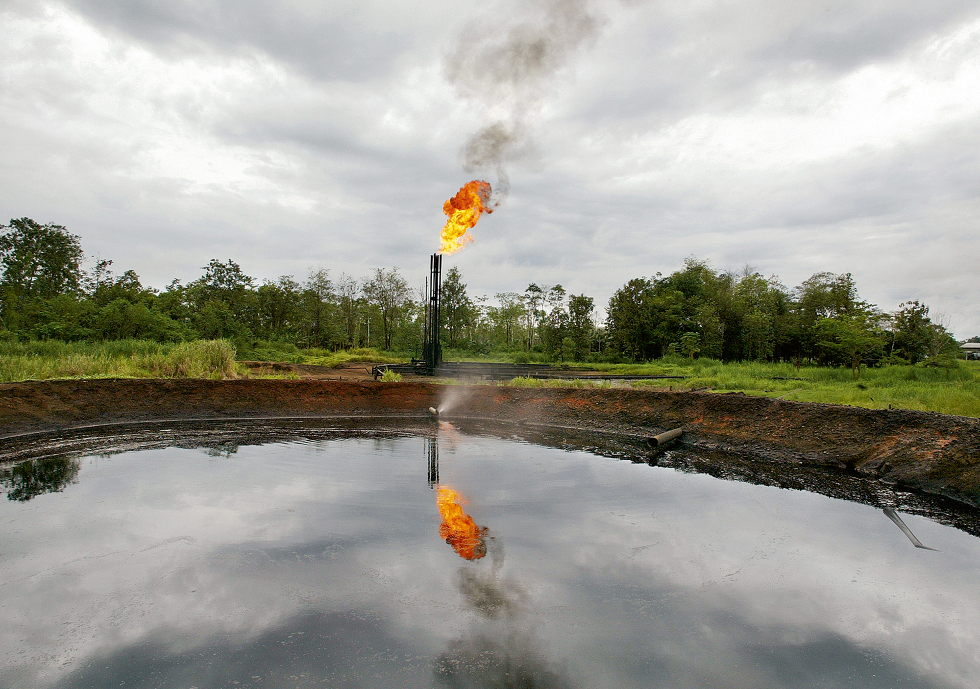 Gas is burned off at a separation station built by Texaco outside the town of Shushufindi in the Ecuadoran Amazon. All photos Lou Dematteis.