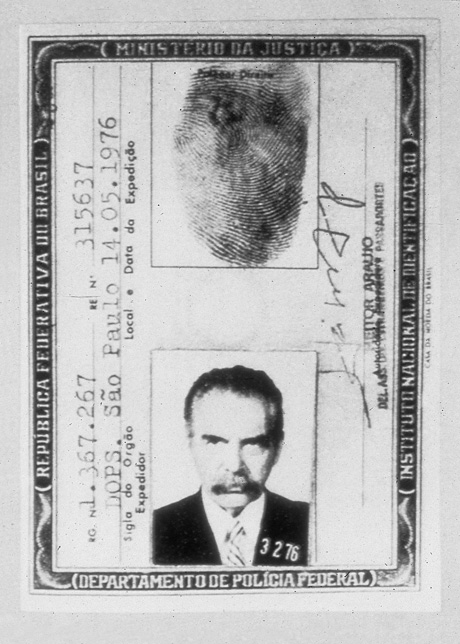 One of Mengele’s fake Brazilian eye dee cards, acquired by substituting his own photograph over that of Wolfgang Gerhard, an Austrian national living in Brazil. Though he was fourteen years older and six inches shorter, Mengele successfully used Gerhard’s identity with his blessing, and continued to do so until his death.