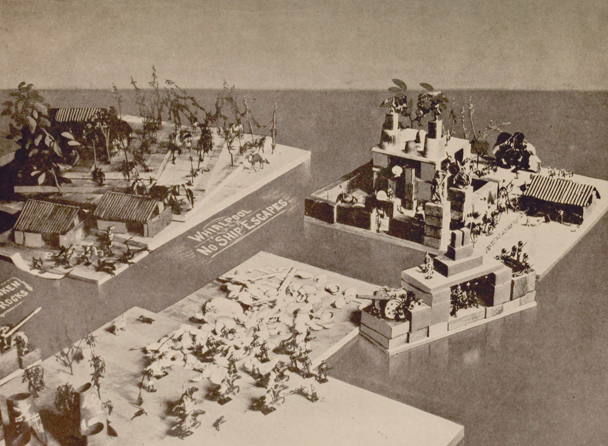 A photograph taken by H. G. Wells from the nineteen twelve edition of his “Floor Games.” It depicts “the Island of the Temple and the invasion of the Indians’ territory by Captain G.P.W.” 