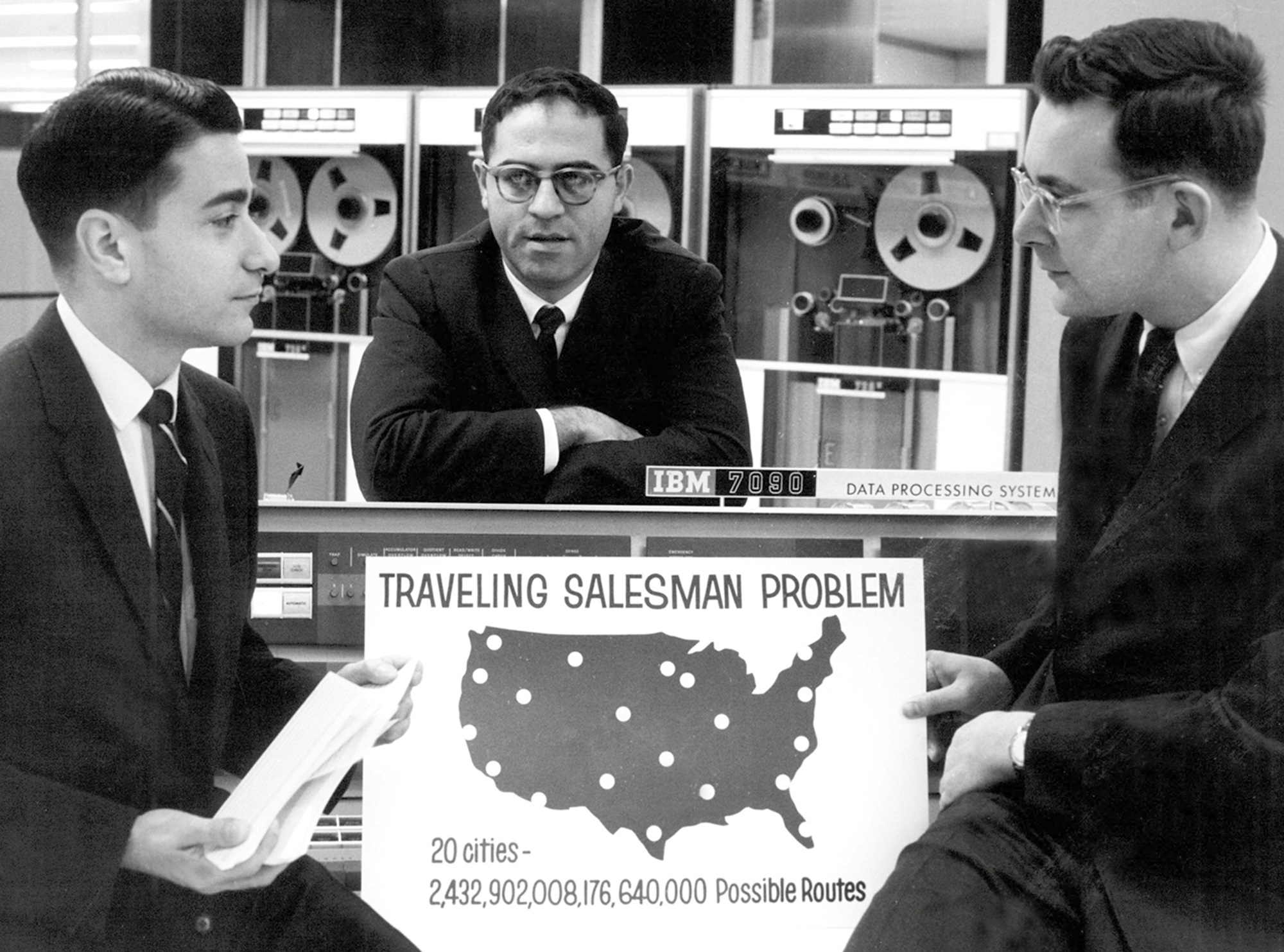 A photograph of three men who researched the Traveling Salesman Problem. The early nineteen sixties saw the earliest intensive use of electronic computers in TSP research. The new computational power changed the kinds of solution strategies available. TSPs are solved by adopting a variety of tactics that narrow the domain of possible routes, or otherwise point out promising avenues. These approaches are often very beautiful (one of the most intuitive and elegant is a mathematical version of ant-swarming behavior, where best routes are amplified over time by means of a build-up of “pheromones”—a sequential weighting of routes that have proven productive in the course of millions of random walks). Richard Karp, shown at right here with colleagues at IBM, was a pioneer of what is known as “Branch and Bound” technique. Using it, he and Michael Held (at left) bested Dantzig et al’s forty-nine-city record by producing an optimized fifty-seven-city tour in nineteen sixty-four. 