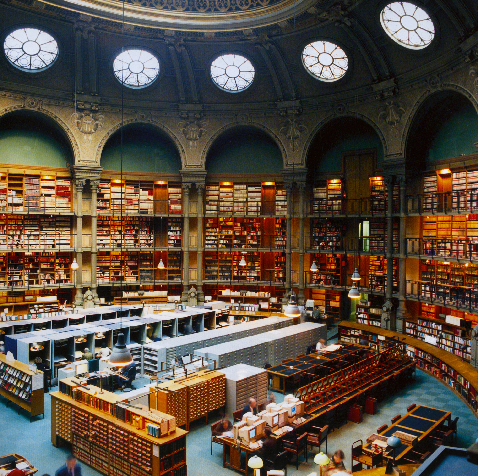 Candida Höfer’s nineteen ninety-eight photograph of France’s Bibliothèque nationale.