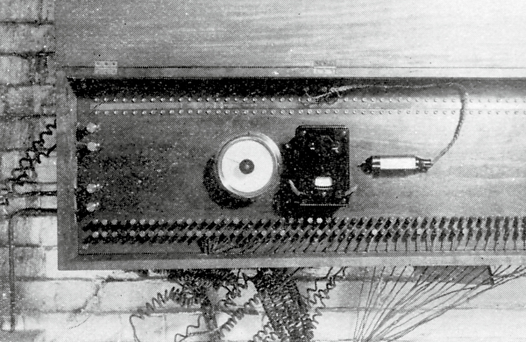 A circa eighteen ninety-seven photograph of the thermophone in the engine room of the Quincy Market Cold Storage Company, Boston.