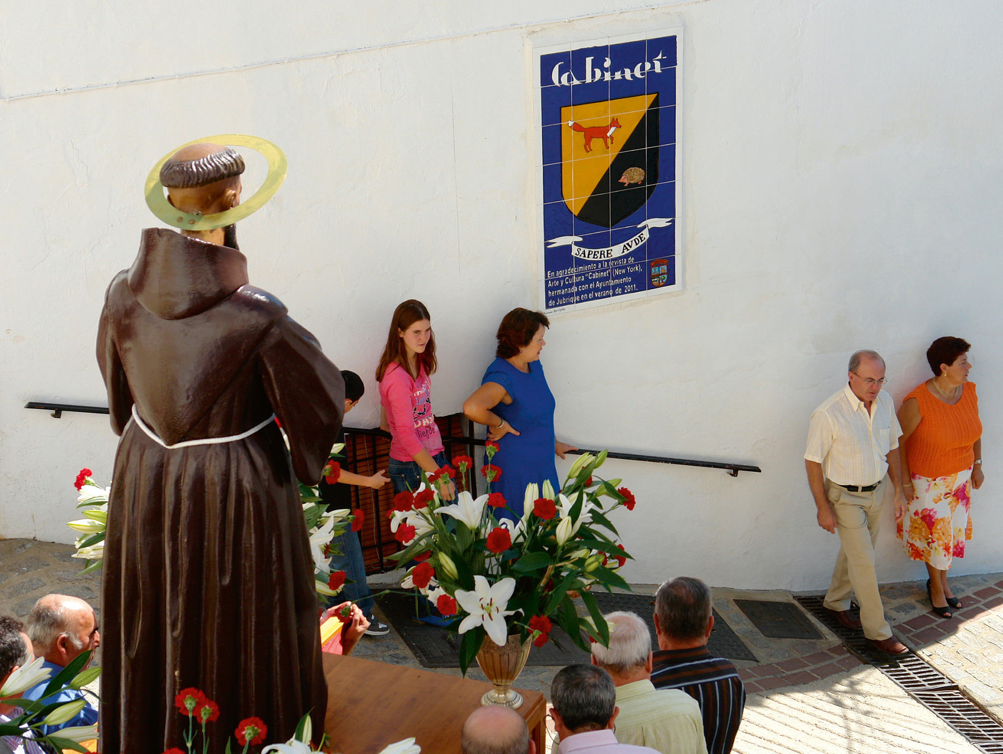 Jubrique’s patron saint, Francis of Assisi, contemplates Cabinet’s fox and hedgehog during the 2012 annual religious procession. Photo Carolan Price.