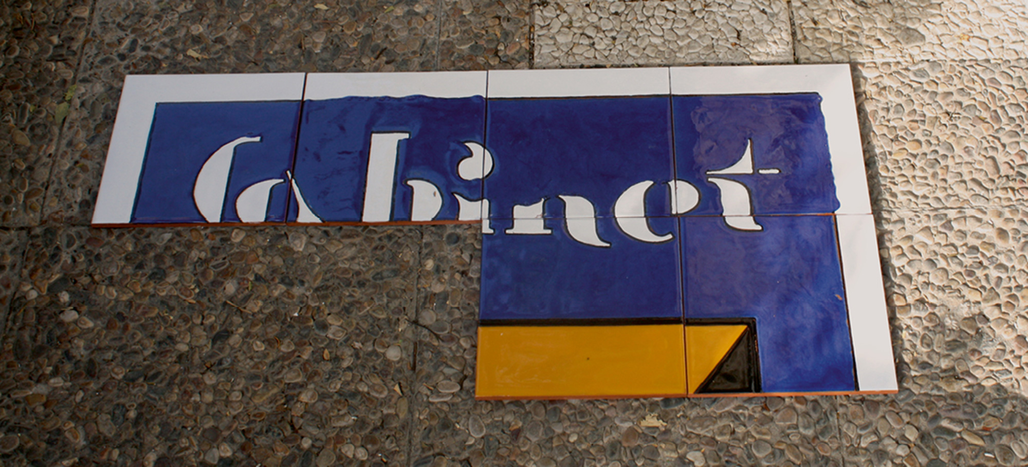 A photograph of Maria Guillén’s ceramic tiles of Cabinet’s shield awaiting installation.