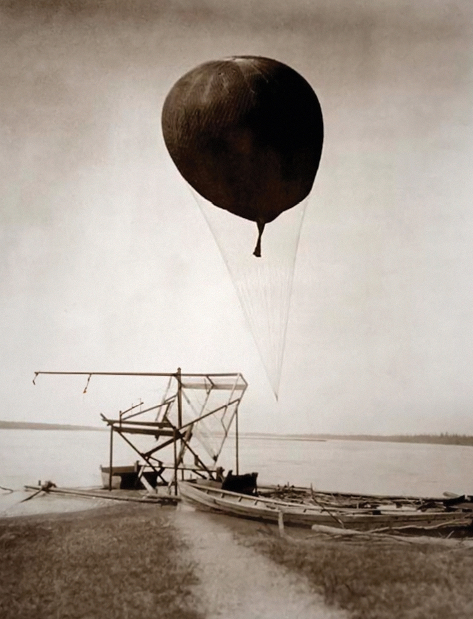 Oliver Wasow’s twenty ten artwork “Trappes, France.” It depicts some kind of balloon rising from a primitive dock. 